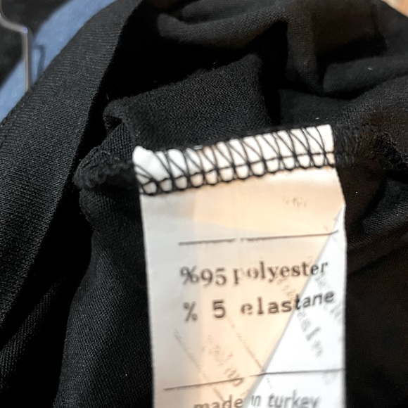 Black pullover blouse with polka dotted shoulder and arms. Size 42 or Medium - Picture 9 of 10